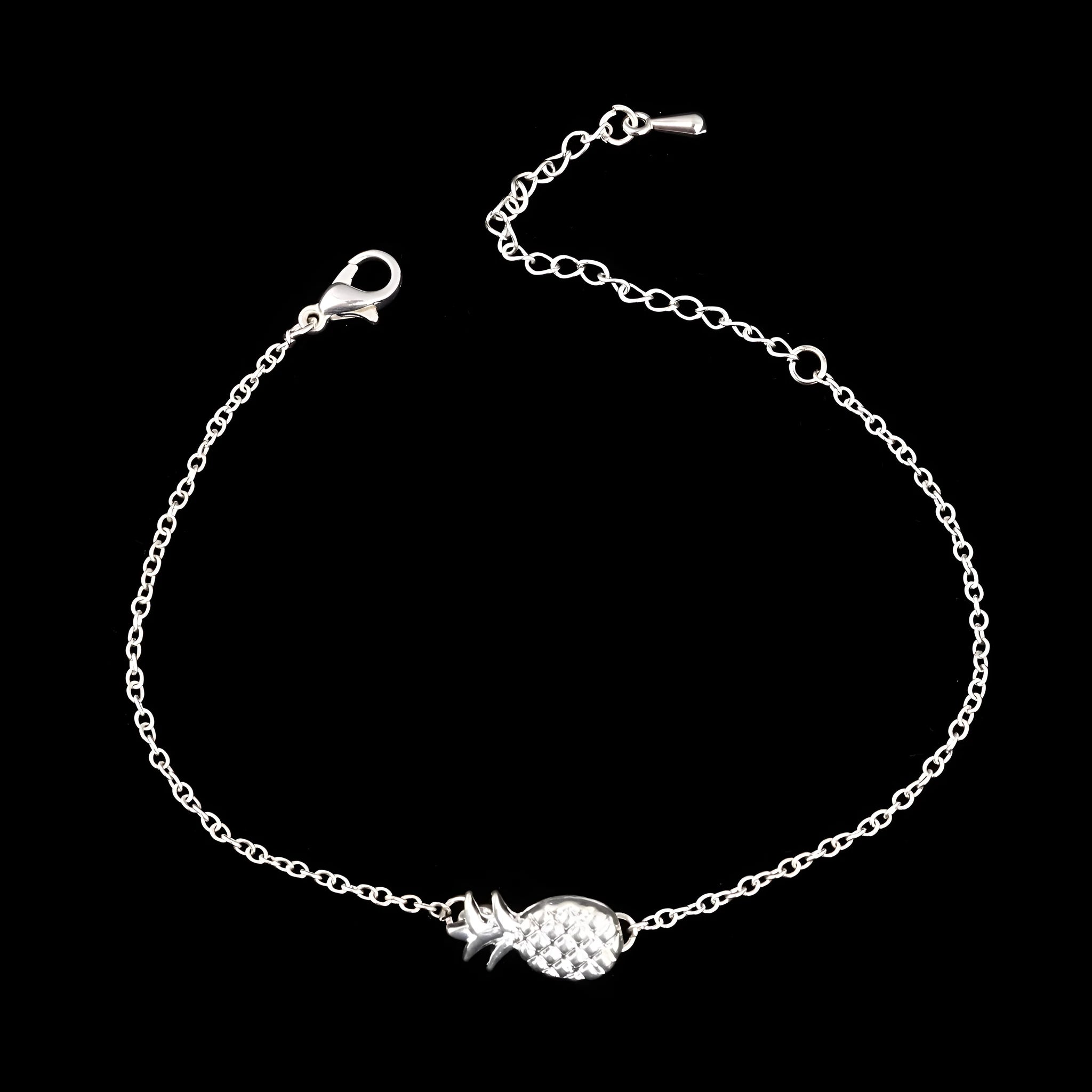 Women's alloy bracelet with a detailed pineapple charm in gold or silver tone.