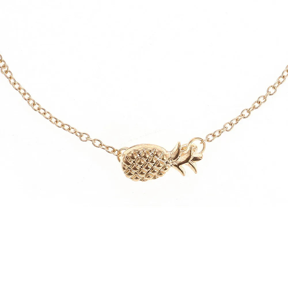 Women's alloy bracelet with a detailed pineapple charm in gold or silver tone.