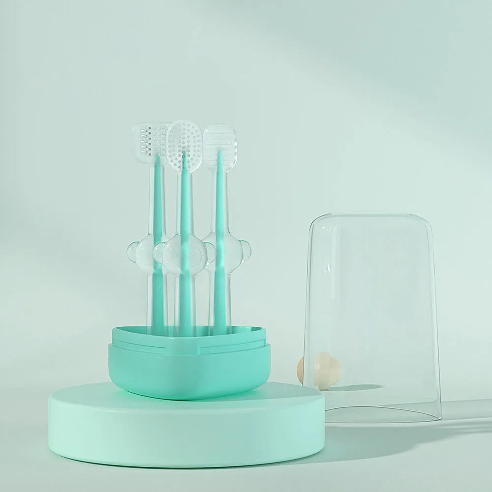 Soft silicone pet toothbrush for dogs and cats in blue, green, and purple colours for cleaning teeth and reducing bad breath.