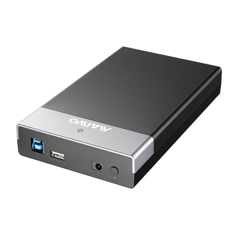 3.5 inch SATA to USB 3.0 hard disk enclosure in black and silver colour with power supply and data cable.
