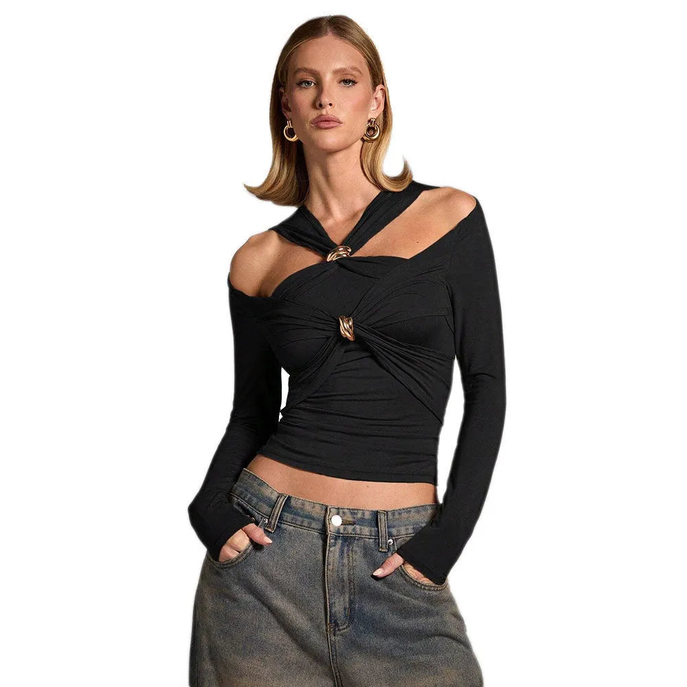 Black women's slim fit halter neck cropped top on a model, showing the sleeveless shoulder-baring design.