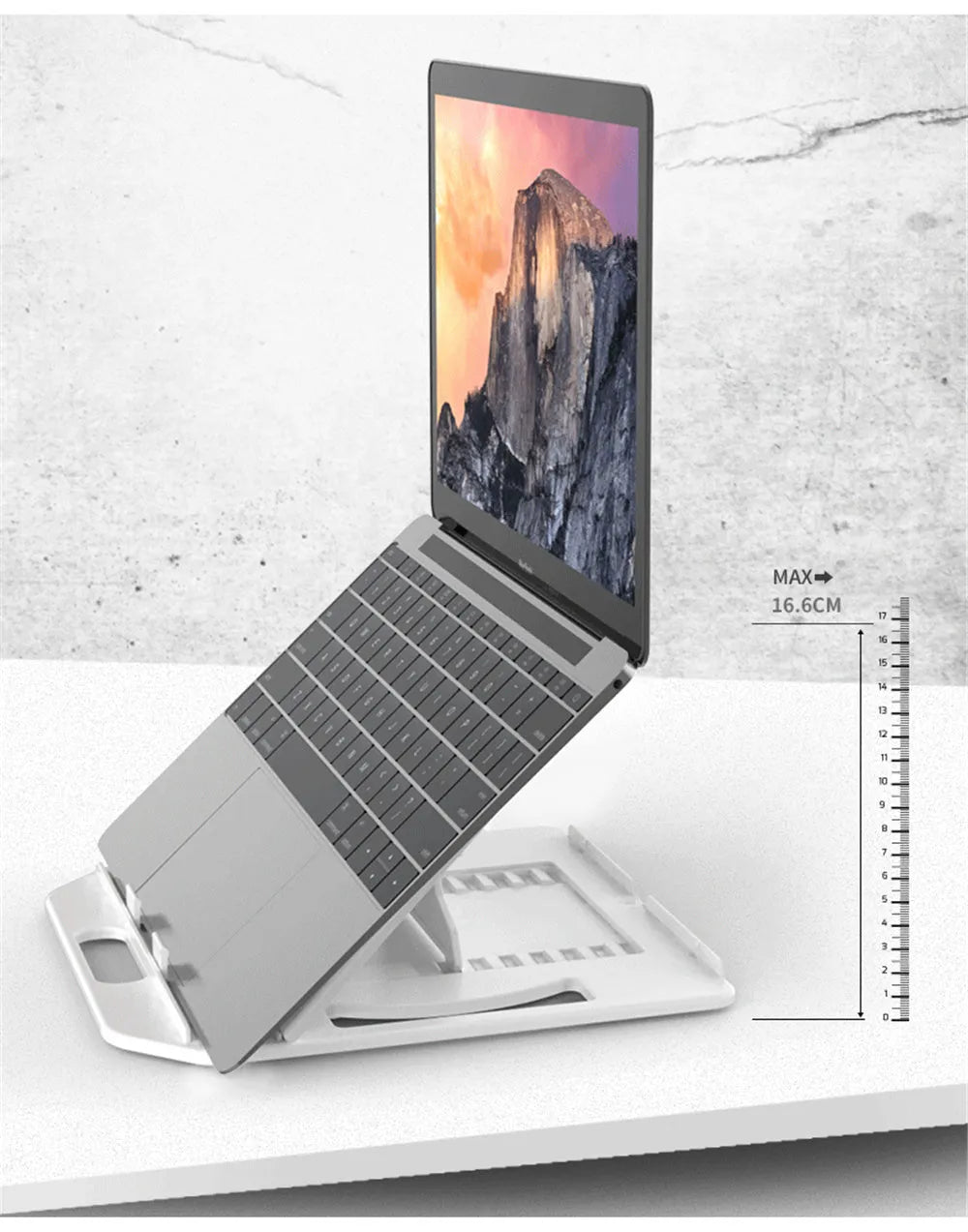 Adjustable folding laptop stand with phone holder in black, 28 cm width, plastic construction with hollow heat dissipation