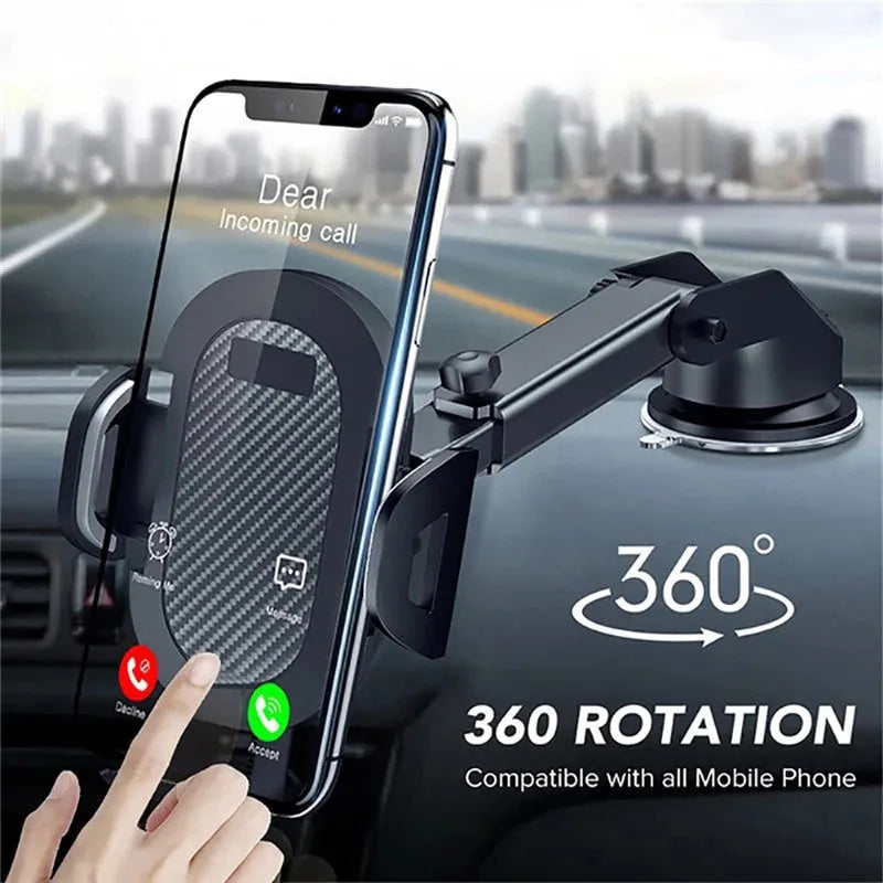 Black car phone holder for smartphones between 4 and 7 inches on a car dashboard