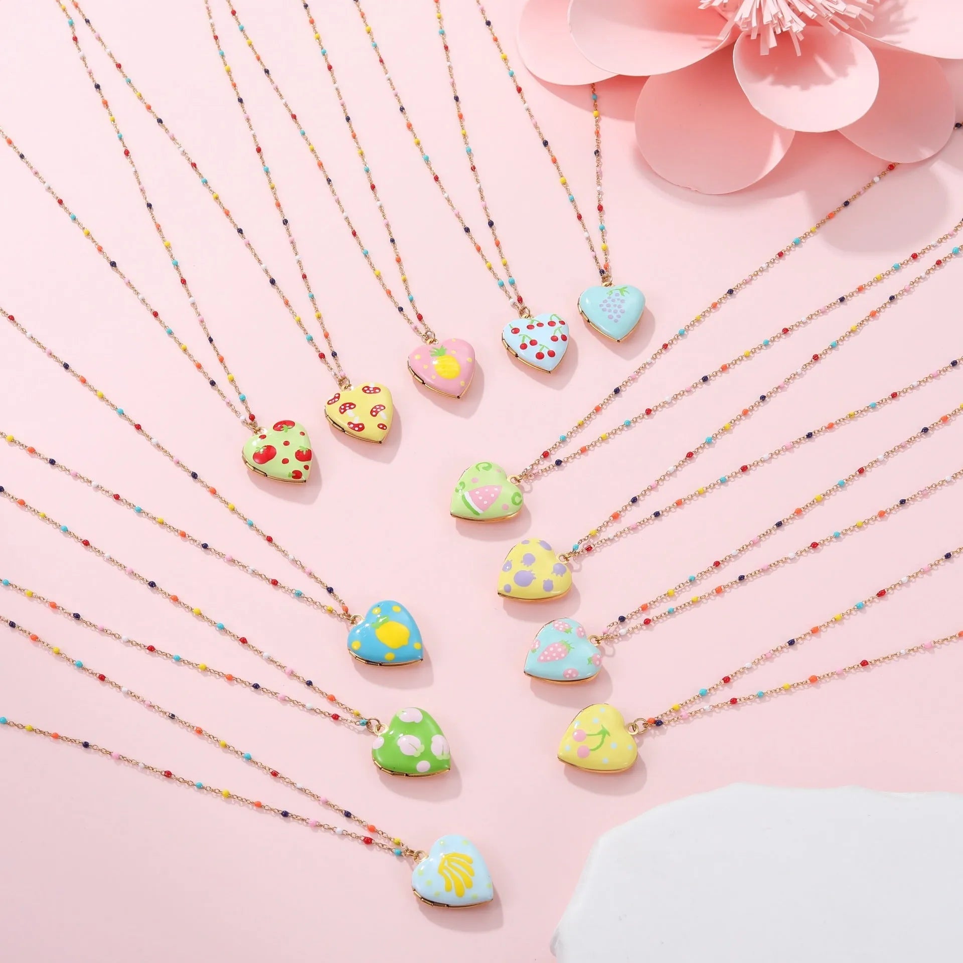 Gold plated fruit charm necklace with heart-shaped pendant on adjustable stainless steel chain