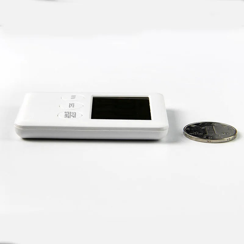 Kitchen timer with magnetic back and large display in black or white colour options