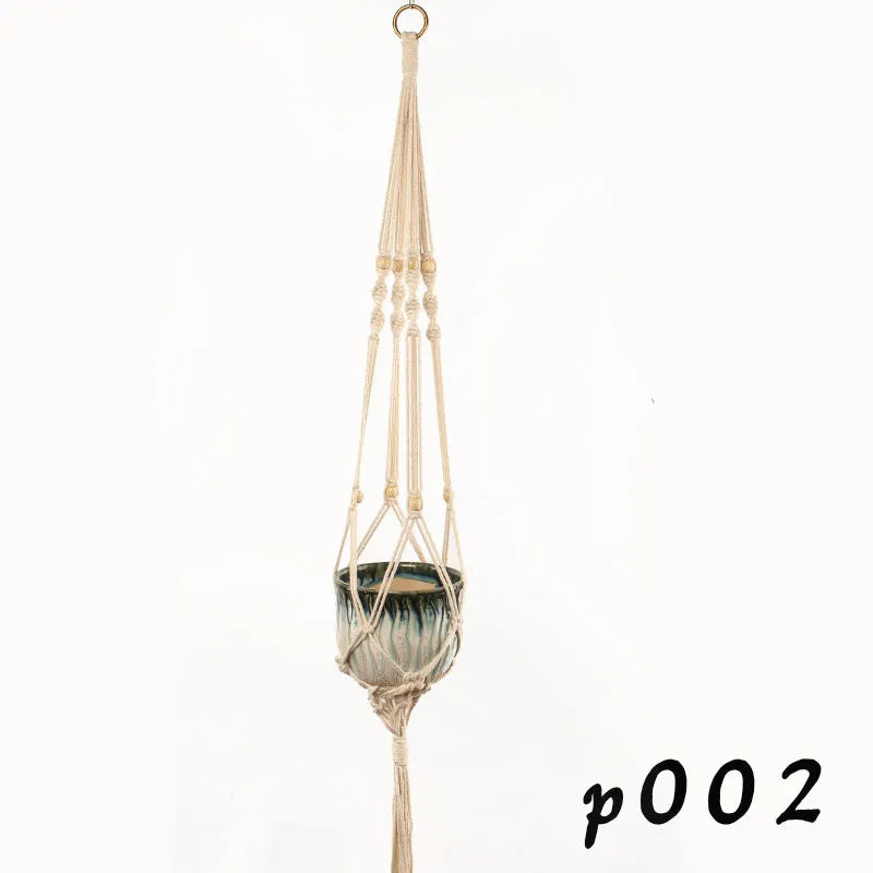 Woven wire and cotton rope macrame plant hanger in a rustic style, shown as a hanging basin.