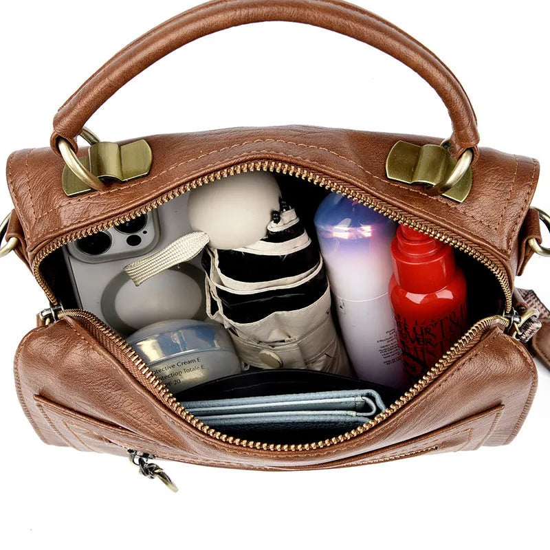 Gray soft PU leather women's crossbody bag with a horizontal square shape and a front sandwich pocket.