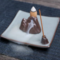 Square purple clay ceramic incense burner with lotus and plum blossom motifs
