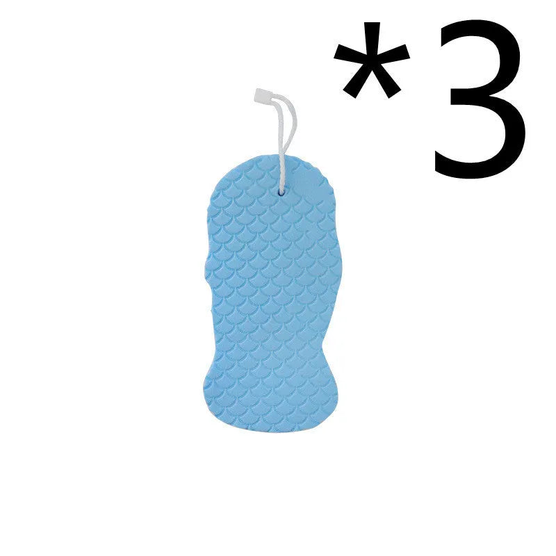 3D white bath sponge with fish scale pattern for gentle body exfoliation.