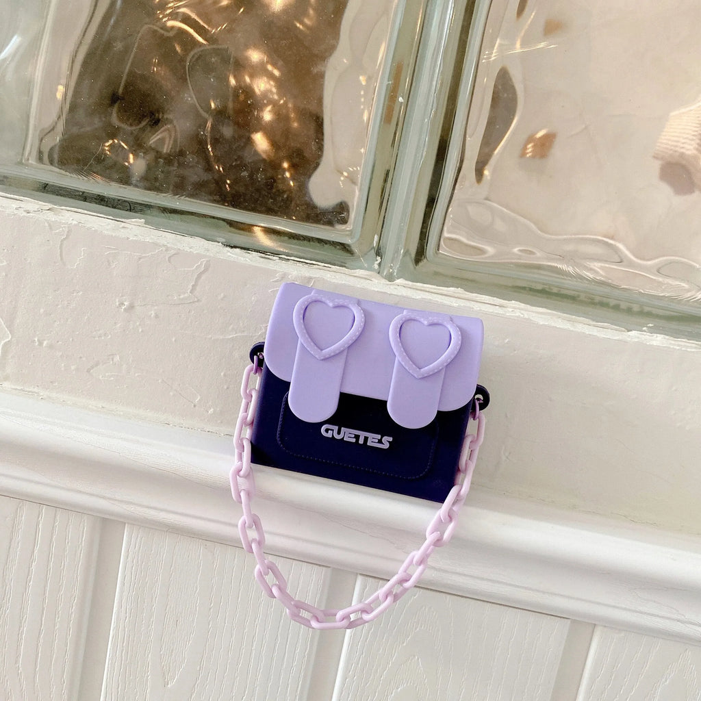 Silicone clamshell earphone case with chain bag in purple, compatible with AirPods Pro and AirPods 1/2