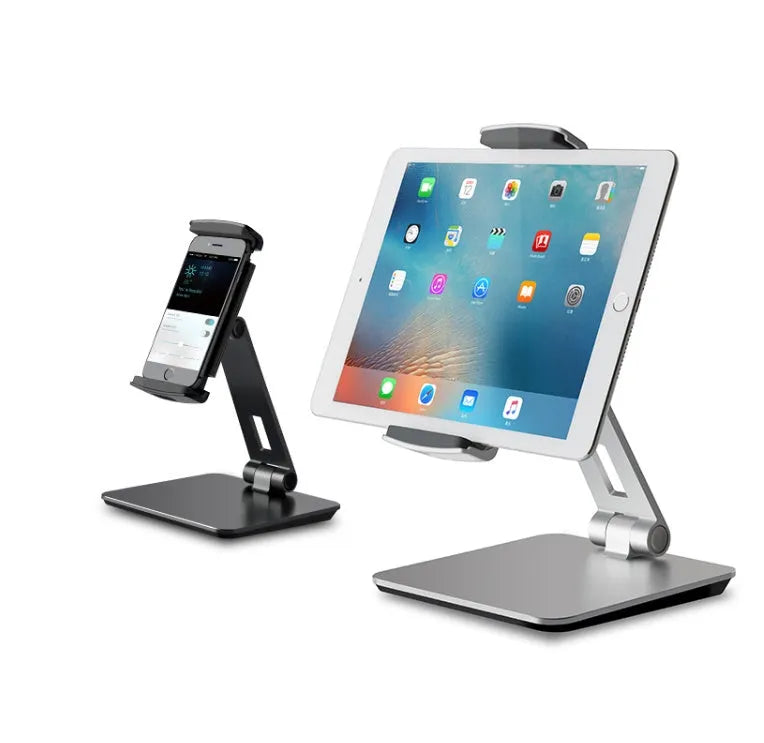 Black folding phone tablet holder with 360° rotating head on desktop