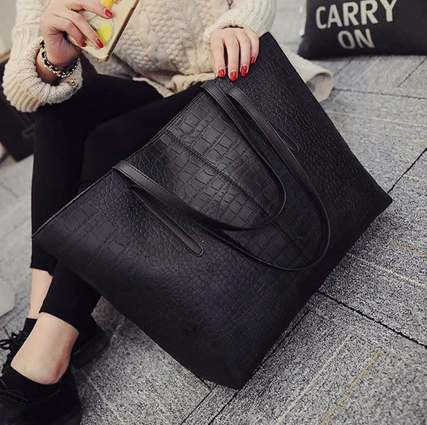 Simple European fashion shoulder handbag for spring summer in black and grey colour options.