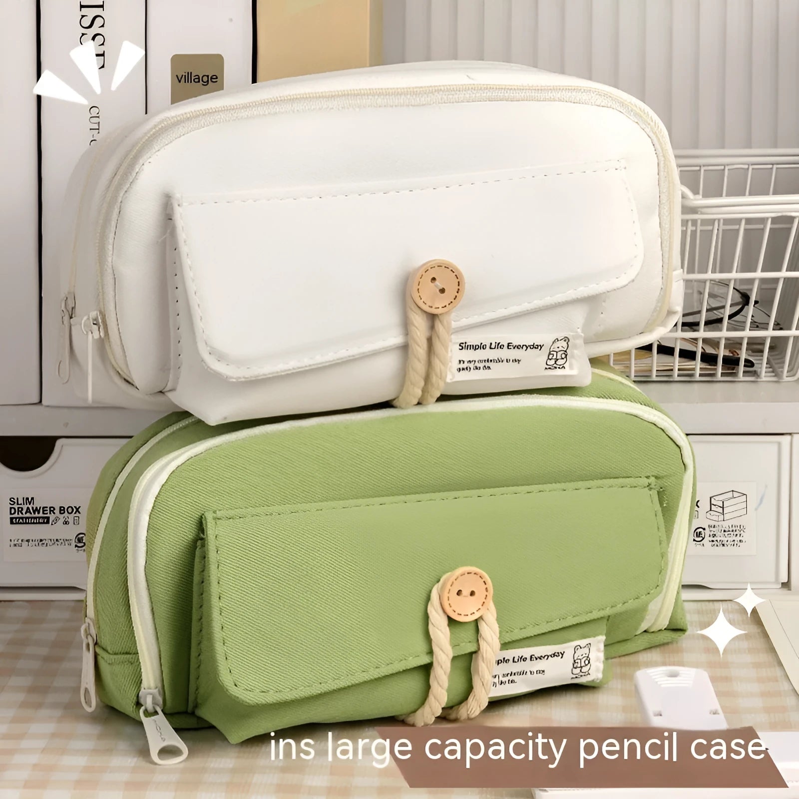 Canvas button-closure pencil case in beige, shown open with pens inside, demonstrating its large capacity.