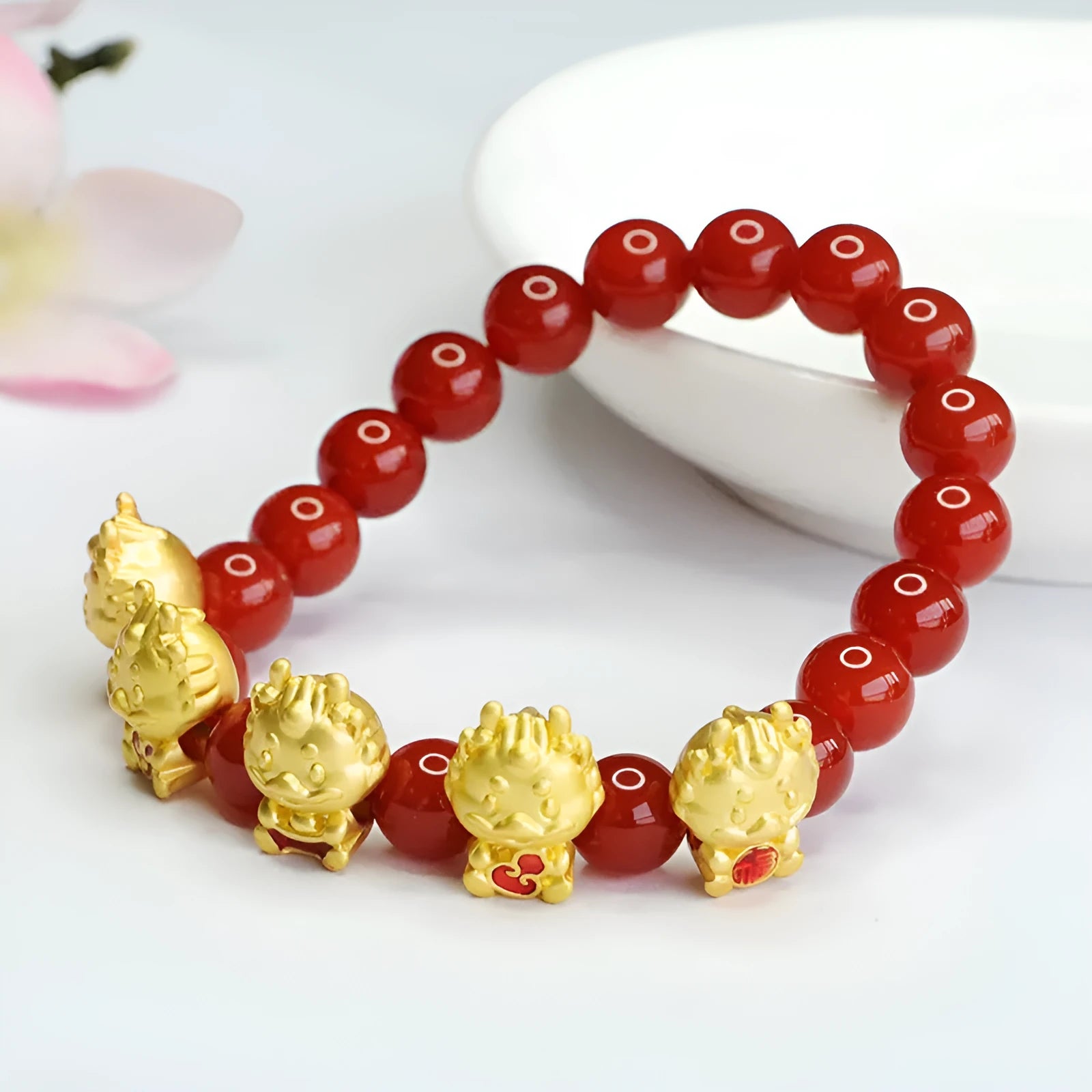 Red agate bracelet with Five Blessing Dragon carvings on 8mm beads