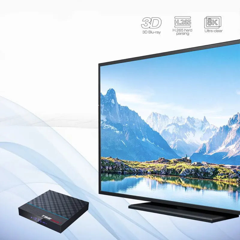 Black T95 Max Plus Android TV box with remote control on a table.
