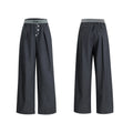 Man's black high-waisted straight-leg casual trousers with a button fly.