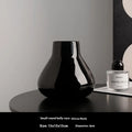Ceramic round belly French vase with coloured glaze finish and fabric flowers in black or white option