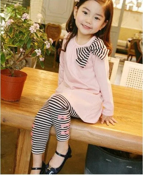 Pink cotton girls' clothing set showing matching top and bottom, for sizes 110cm to 140cm.