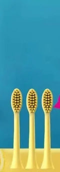 Yellow rechargeable electric toothbrush with USB charging port and soft bristle brush head