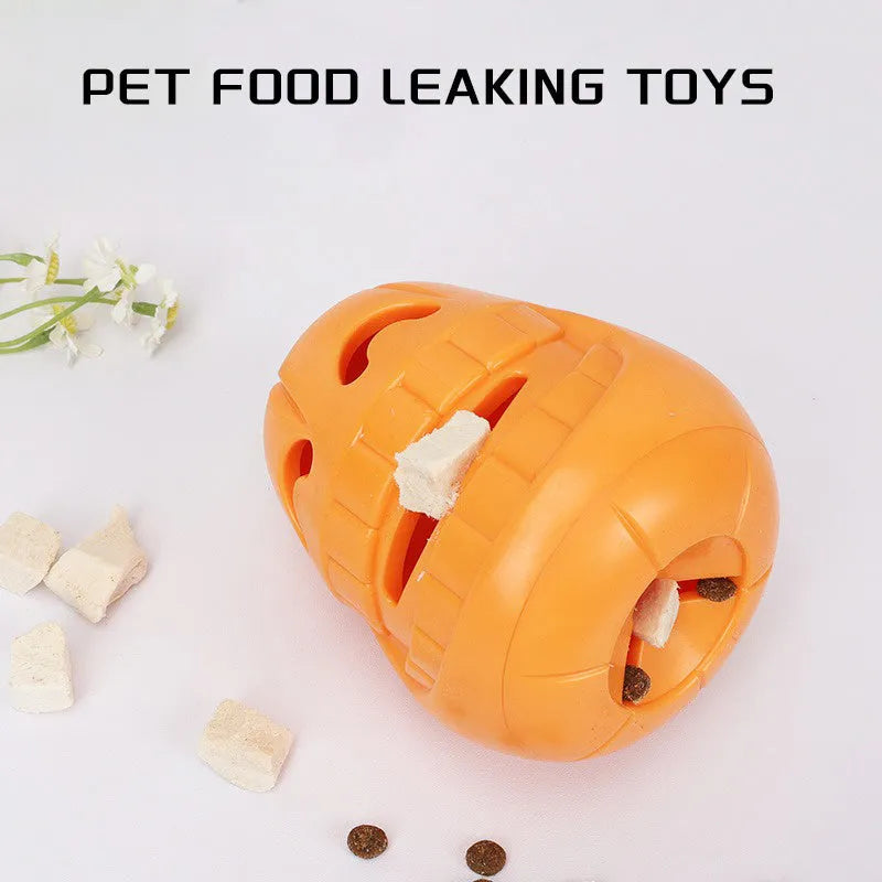 Orange Halloween pumpkin shaped rubber dog toy with a hollow centre for treats.