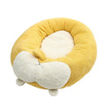 Corgi-shaped plush pet bed for dogs and cats in grey, shown in a home setting.