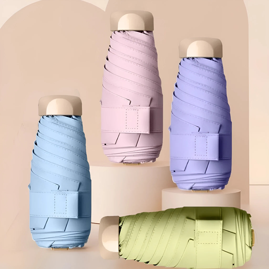 Compact folded five-fold sun umbrella with vinyl canopy and alloy frame in a choice of eight colours.