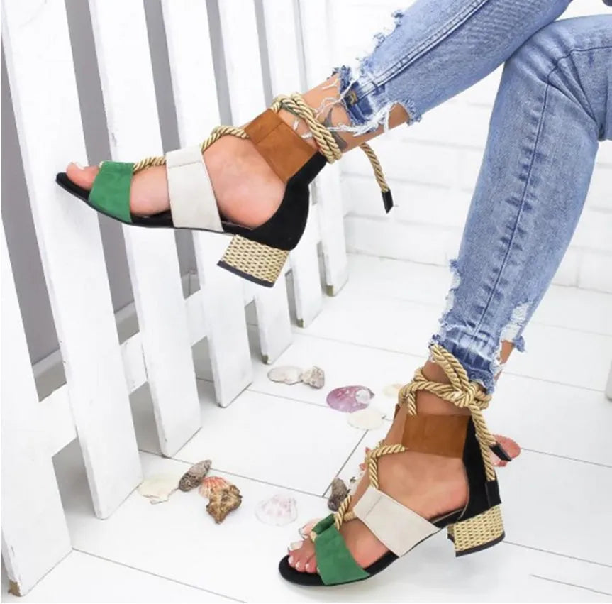 Women's beige suede sandals with thick matching heels and front strap design