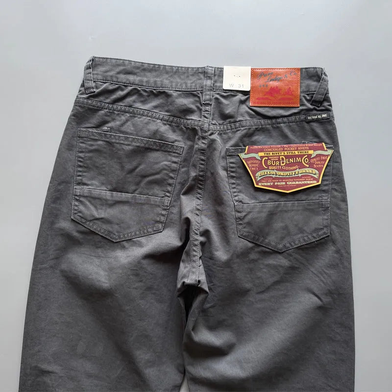 Men's straight-leg cotton casual trousers in grey, shown flat.