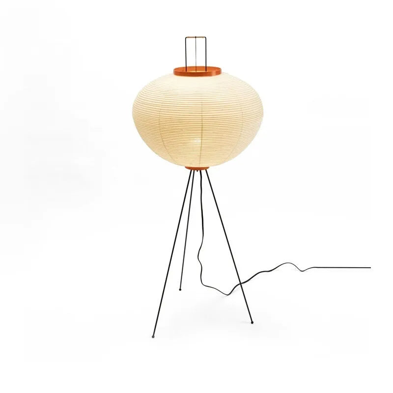 Japanese style rice paper table lamp with handmade shade and aluminium base on wooden surface