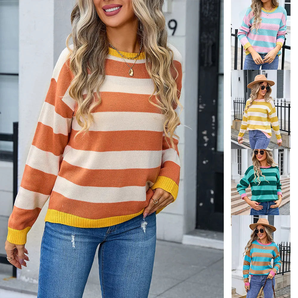 Women's loose fit long sleeve round neck sweater in a striped pattern, shown in a blue colour option.