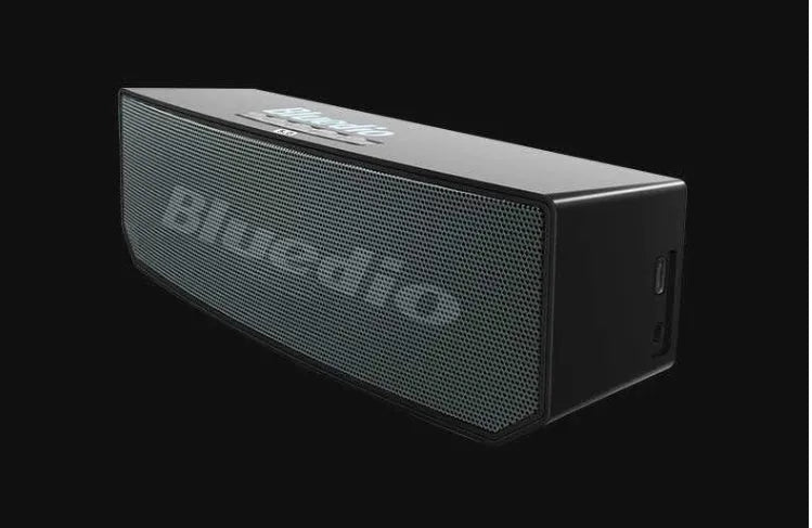 BS-6 black cloud smart speaker showing compact dimensions and speaker grille