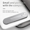Silver aluminium laptop side mount bracket holding a mobile phone next to a laptop screen.