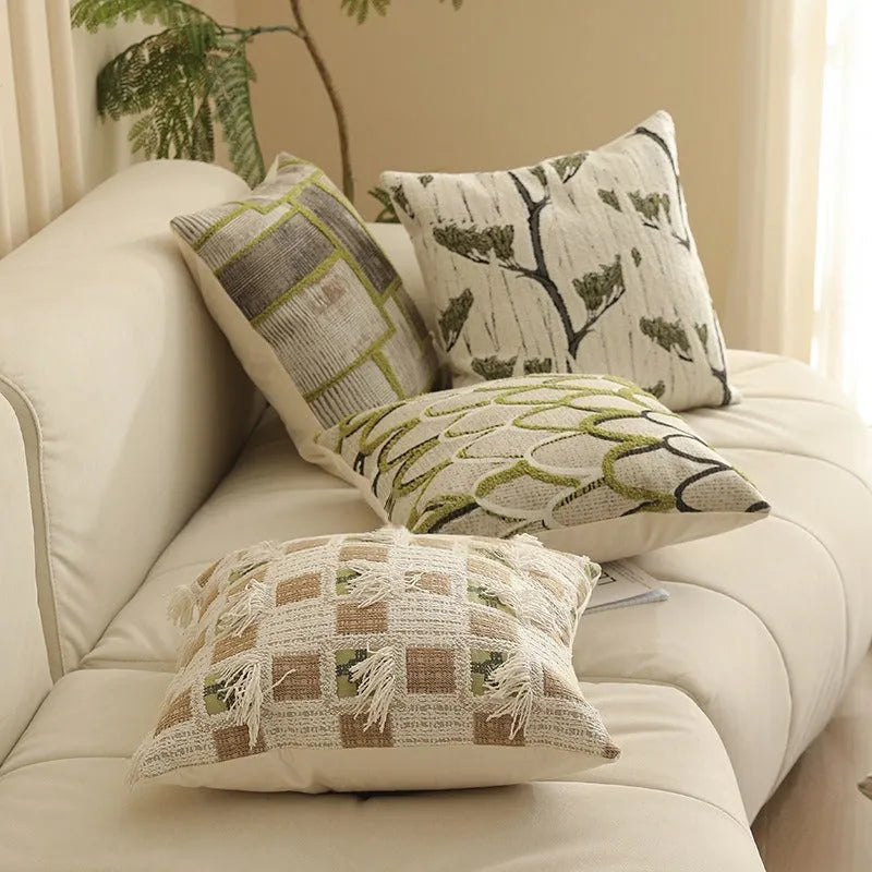 Close-up of a retro floral jacquard cushion cover in a choice of colours, showing texture and zip detail.