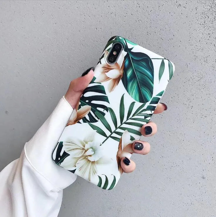 Green banana leaf floral pattern TPU phone case for iPhone on wooden surface