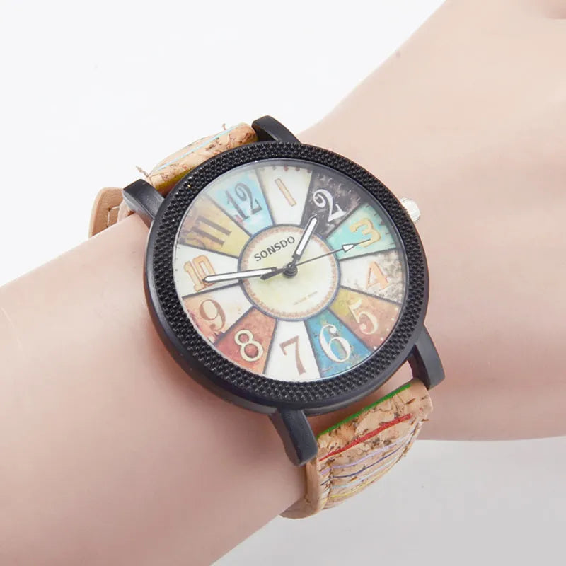 Casual women's wrist watch with leather strap showing 37mm round dial and stainless steel buckle