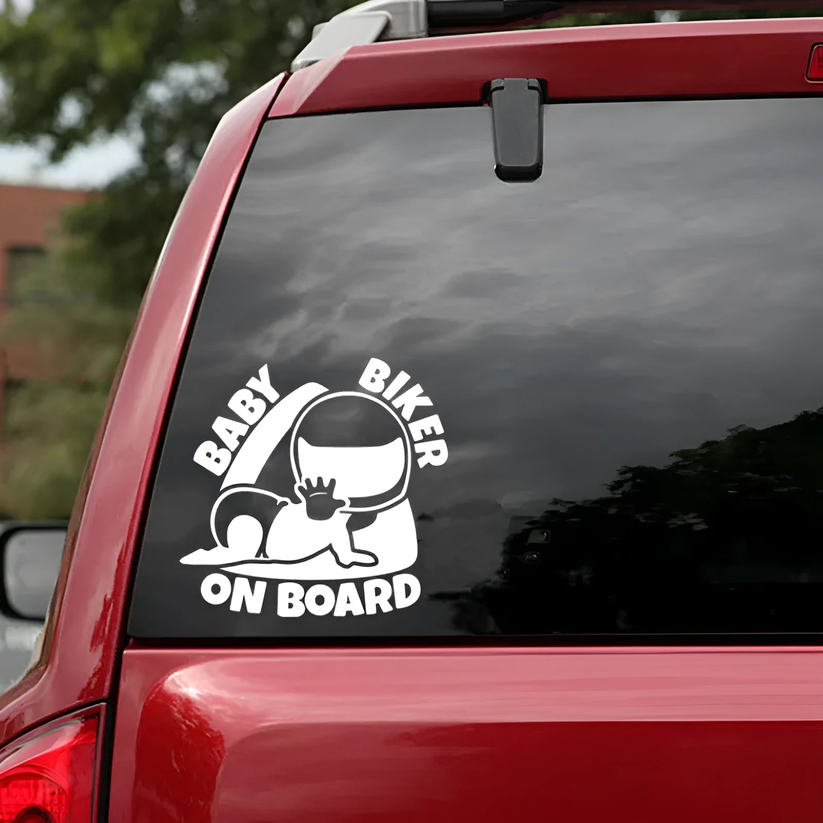 Black and white reflective Baby On Board vinyl car sticker measuring 14.5 by 15 centimetres.