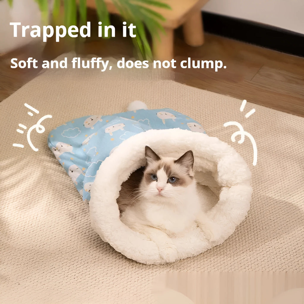 Blue rabbit patterned flannel cat sleeping bag nest measuring 50 by 40 centimetres.