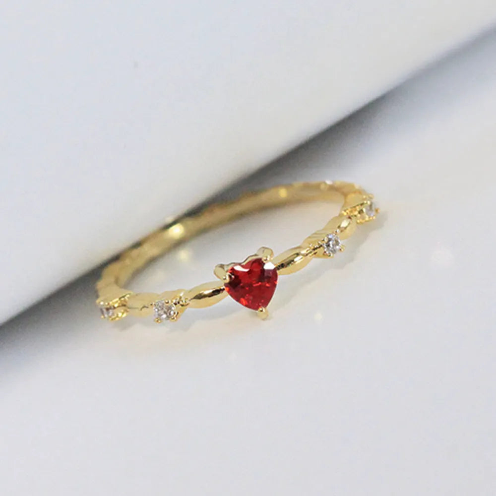 Geometric peach heart ring with zircon detail in gold or silver electroplated finish