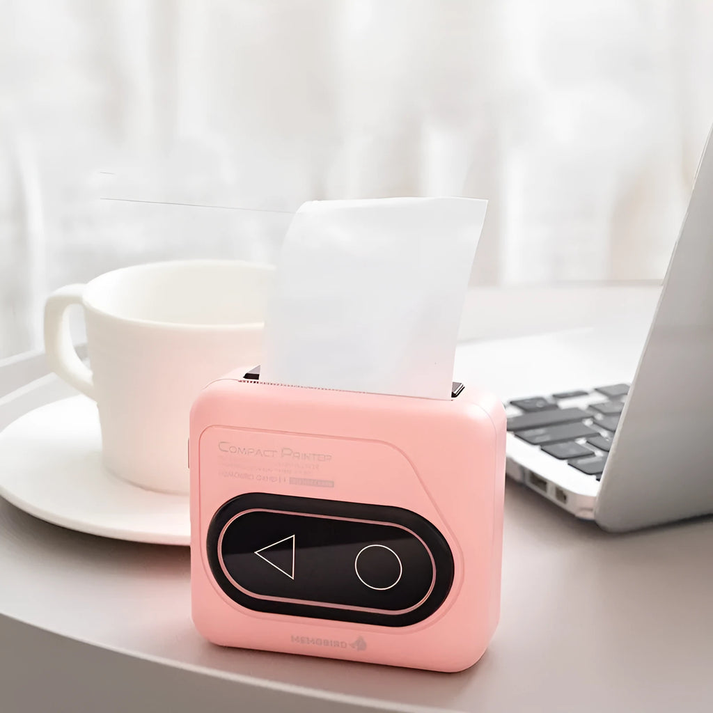 Portable Bluetooth thermal printer in avocado green, pink, small yellow duck or white colours