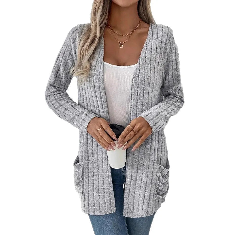 Solid colour long sleeve cardigan with pockets in loose fit, available in grandma grey or black