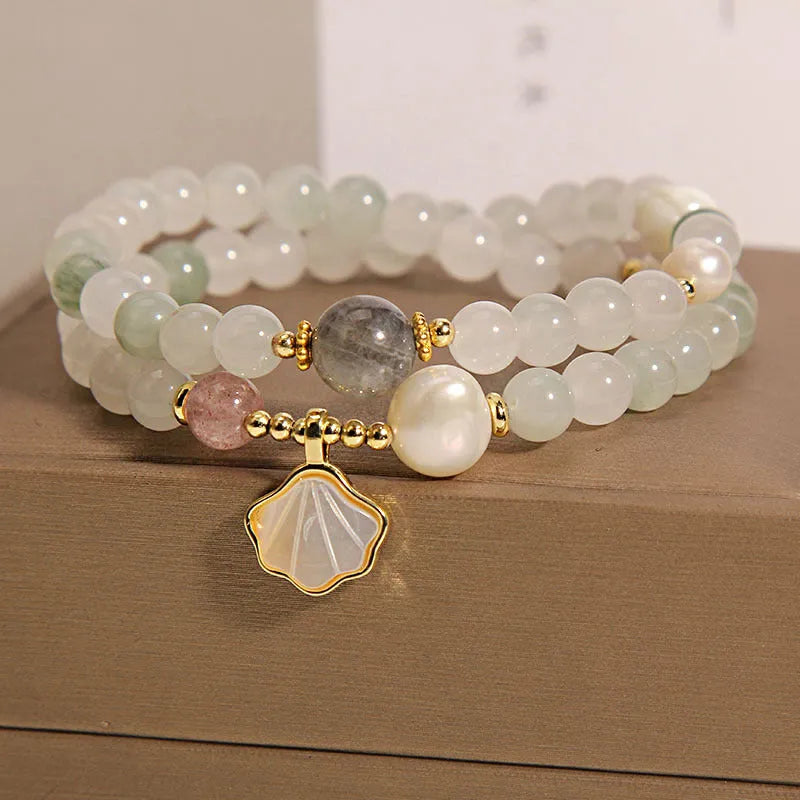 Women's crystal bracelet with Tianshan jade ginkgo leaf pendant and gold-plated gemstone settings