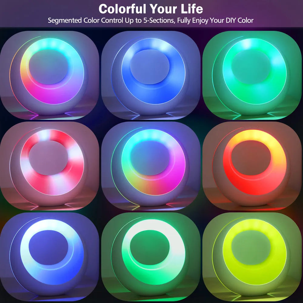 Small white RGB colour changing desk lamp with remote control on wooden surface