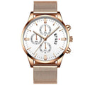 Men's stainless steel mesh band quartz watch with analog display on a wrist