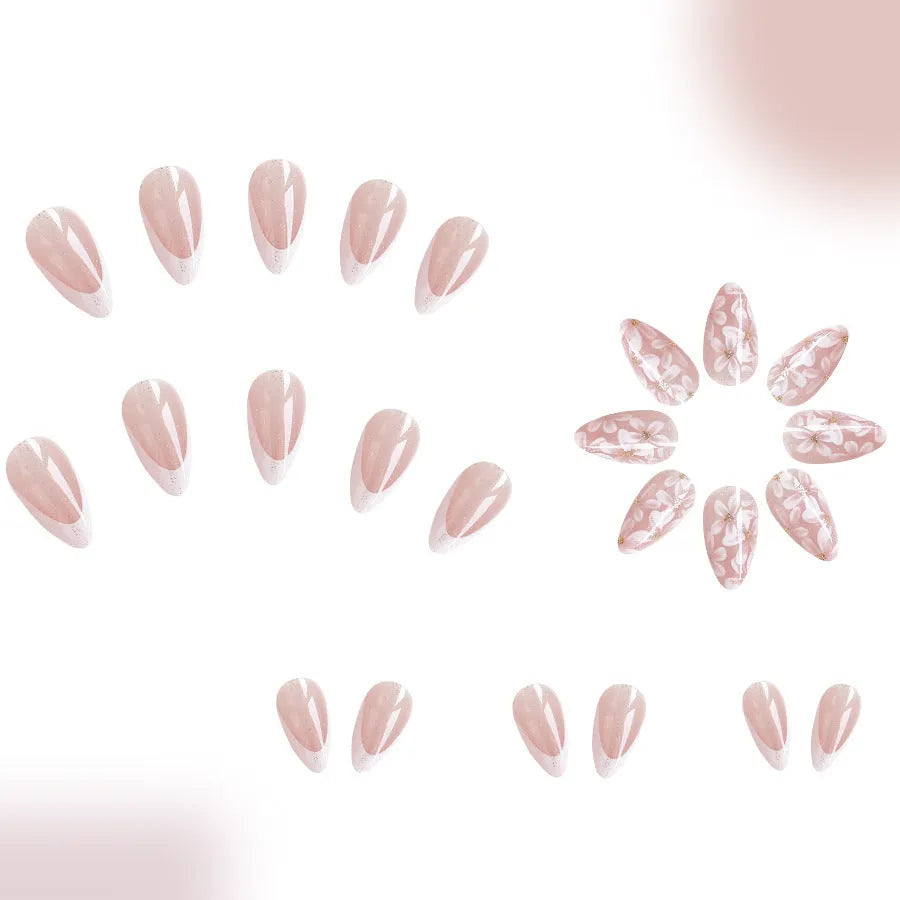 C625 short glossy almond fake nails with French manicure, glitter, and pink powder flowers.