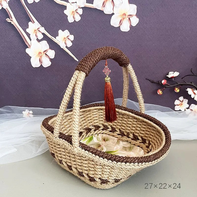 Coffee brown hand-woven straw basket with hemp rope detailing.