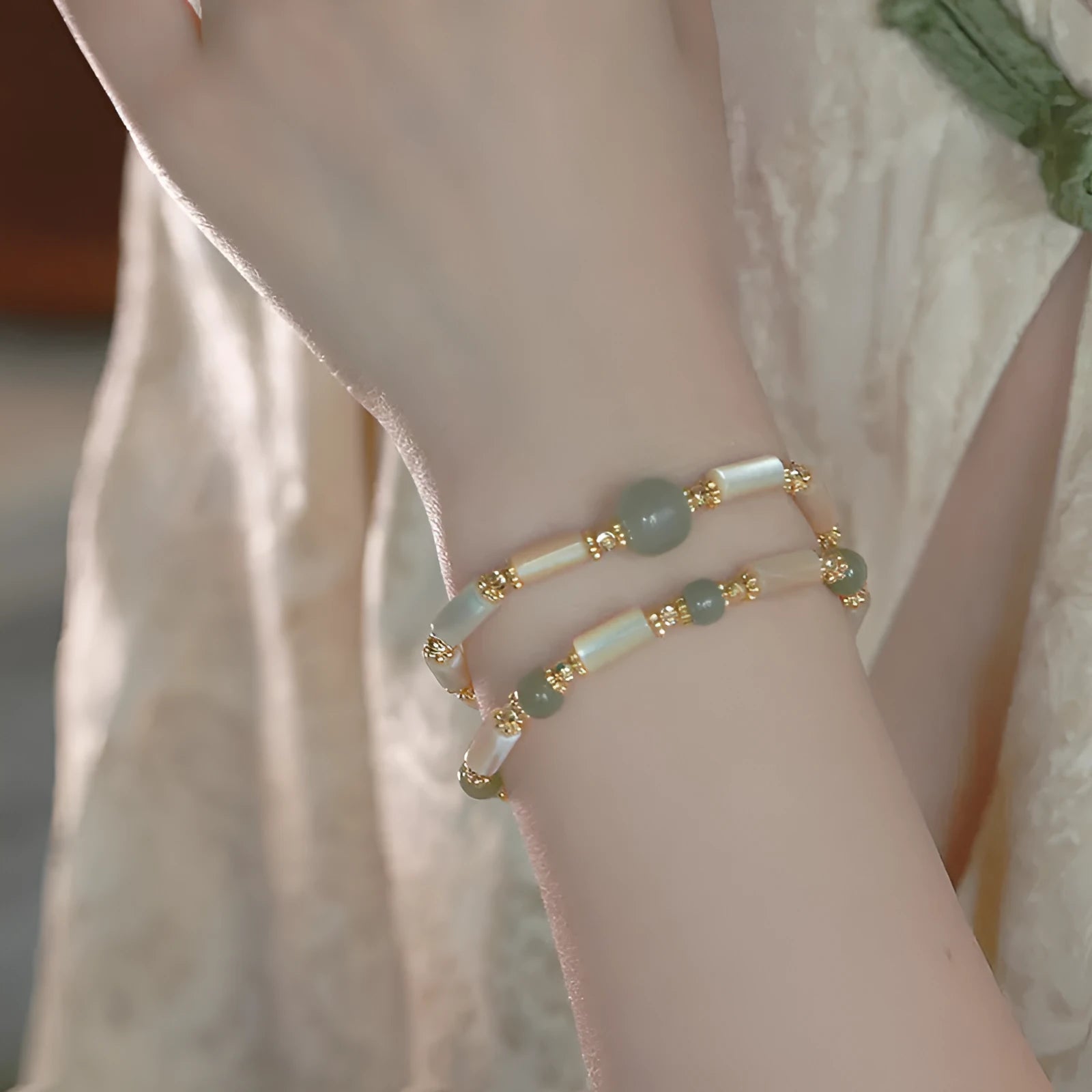 Handmade Hetian Jade white lip shell bracelet with round beads in simple geometric design