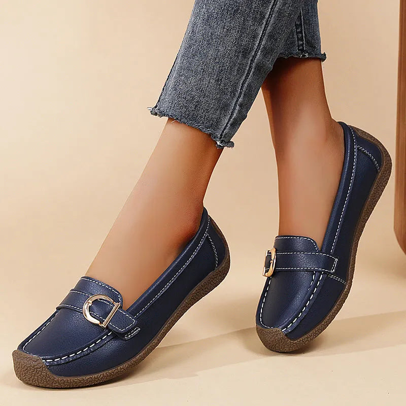 Women's beige casual slip-on loafers with a round toe and flat beef tendon sole.