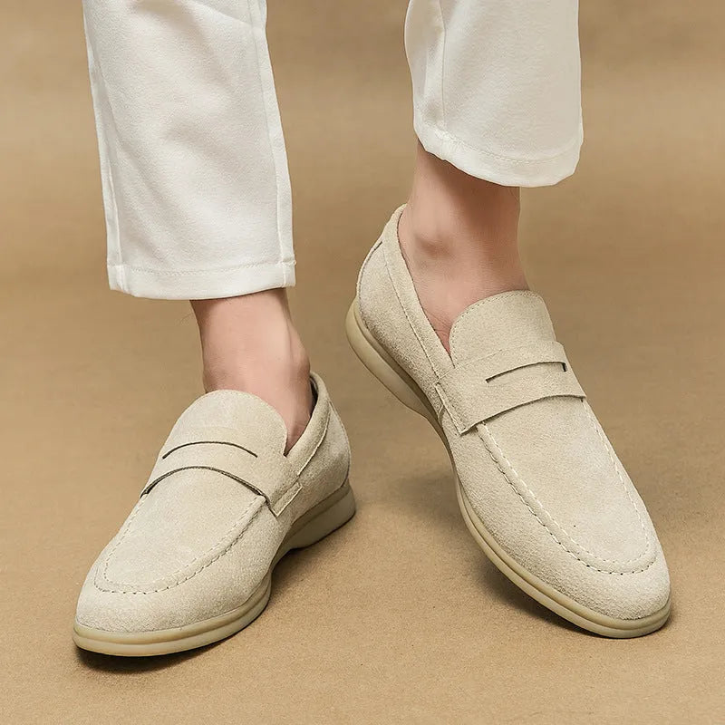 Men's slip-on leather casual shoes in black with round toe and rubber sole