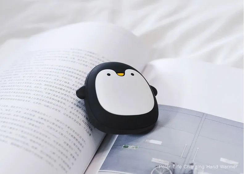 Cartoon penguin polar bear design USB rechargeable electric hand warmer showing front view
