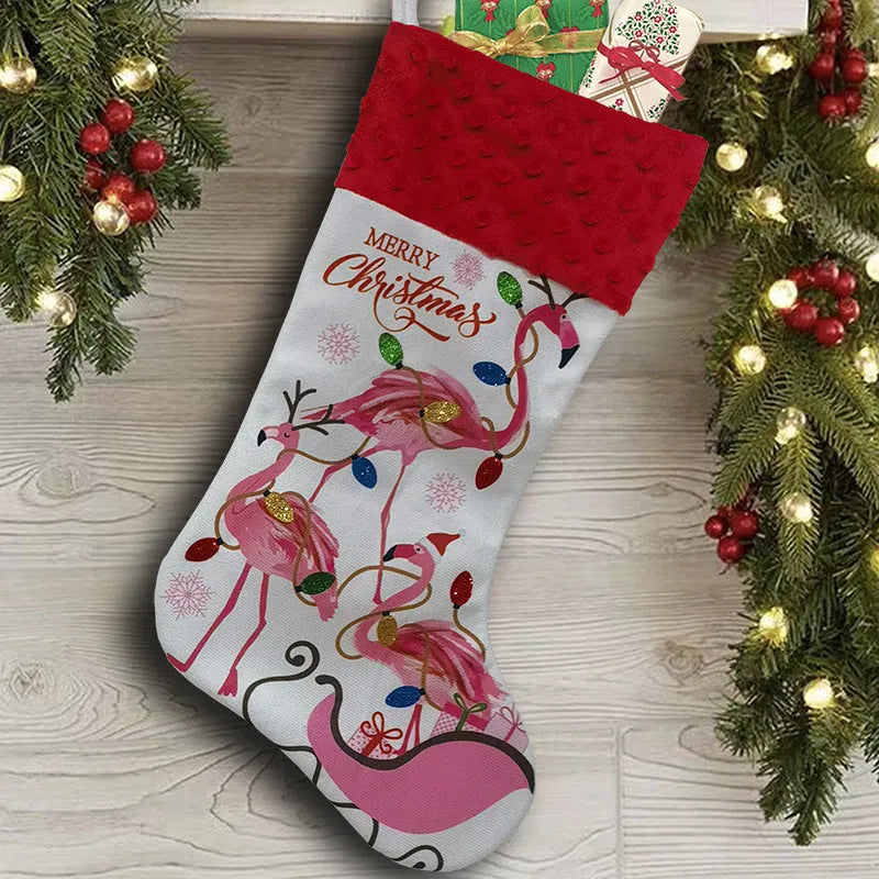 Flamingo patterned cloth Christmas stocking decoration measuring 46 by 28 centimetres.